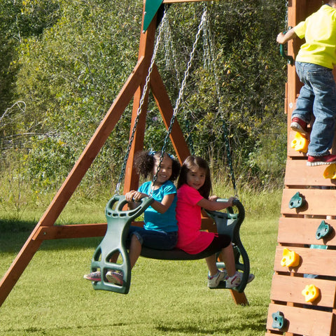 Two children on Dual Ride Glider Back-To-Back Tandem Swing For Kids with green plastic coated chains outdoors