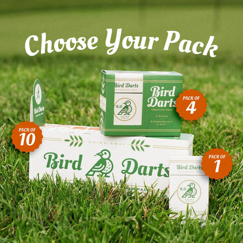 Bird Darts packaging on grass with pack options, labeled 1, 4, and 10, vibrant design in a natural setting.