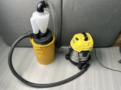 Turbocharged Dual Filtration Cyclone Dust Collector For Woodworking With Two Point Five Inch Hose setup in woodworking shop.