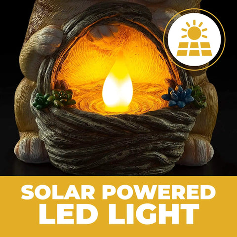 Close-up of Solar Powered LED Outdoor Bunny Garden Light Statue with glowing basket detail.