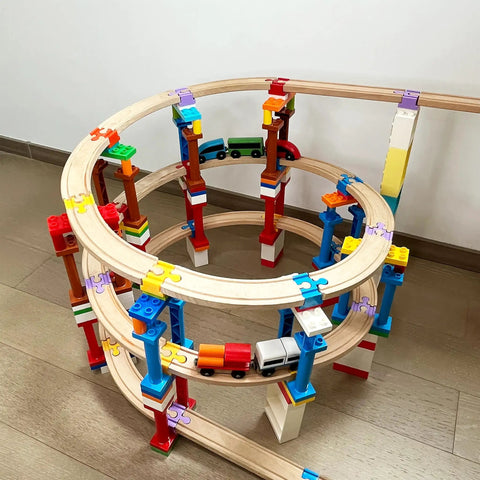 Wooden Train Track Connectors Set 40 Pieces Compatible With All Major Train Brands Duplo 0.35 Inch Holes Risers assembled on wooden floor