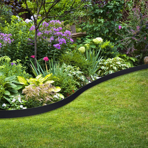 Durable 246 Ft Garden Landscape Edging Kit With Three 82 Ft Rolls bordering a flower bed in a garden