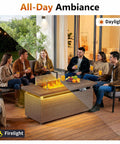 51 Inch Propane Fire Pit Table with 50,000 BTU Smokeless Heat and Glass Wind Guard on patio with people enjoying drinks