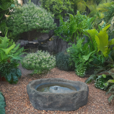 Massive Dope Decorative Outdoor Faux Stone Rock With Realistic Sandstone Look, 24 Inch Wide Boulder in garden setting