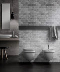 Dark Gray Peel And Stick Floor Tile Set With Faux Marble Look Subway Tiles in modern bathroom for accent wall or floor.