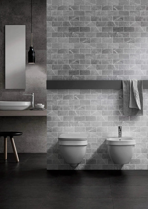 Dark Gray Peel And Stick Floor Tile Set With Faux Marble Look Subway Tiles in modern bathroom for accent wall or floor.