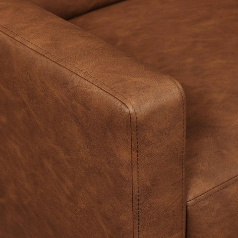 Detail of Cozy Faux Leather Recliner Sofa With Adjustable Back And Footrest Soft Plush Tufted Upholstery And Pocket Spring Support brown armrest