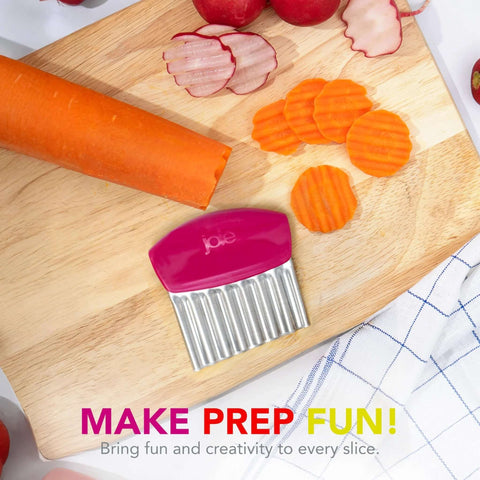Joie crinkle cutter knife with pink handle and stainless steel ribbed blade for making wavy carrot slices