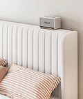 Top Notch Full Size Bed Frame With White Velvet Upholstery And Tufted Wingback Headboard Heavy Duty Steel Rails Solid Slats No Box Spring Needed Clean Bedroom Flex with striped pillows and a speaker.