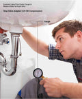 Flow Doctor water pressure gauge kit installed under sink; glycerin-filled gauge with brass fittings