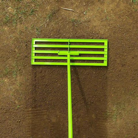 Pro Grade Stainless Steel Lawn Leveling Rake With Adjustable 30 To 74 Inch Handle on soil