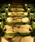 8 Pack Solar Pathway Lights Outdoor 19.8 Inch Tall Metal LED Landscape Lighting With Waterproof Diamond Glass Shade illuminating a walkway