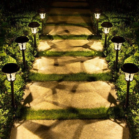 8 Pack Solar Pathway Lights Outdoor 19.8 Inch Tall Metal LED Landscape Lighting With Waterproof Diamond Glass Shade illuminating a walkway