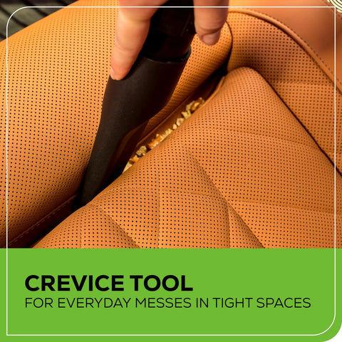 Cordless 40V 3 Gallon Wet Dry Shop Vacuum With Extras in use on car seat with crevice tool attachment, close-up view.