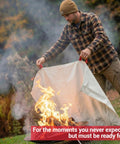 Man using Extra Large 60 By 70 Inch Fiberglass Fire Blanket For Grills BBQs Campfires And Tailgating With Patent Pending Safety Handles