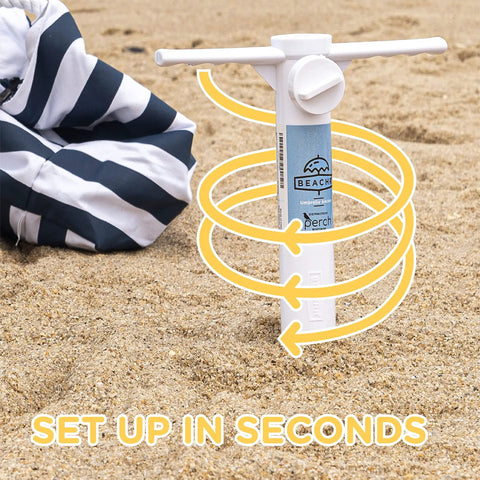 Universal Beach Umbrella Anchor Spike For Sand, Windproof Up To 50 MPH, white 10 inch, inserted in sand showing spiral design