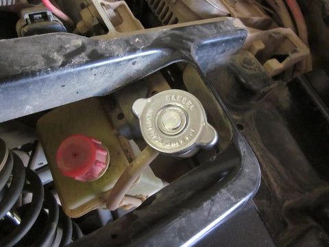 13 PSI Radiator Cap Replacement for Polaris Ranger RZR and General UTVs installed in vehicle cooling system