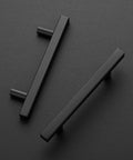 Two 6-inch matte black stainless steel cabinet pulls on a dark background, part of 60 Pack 6 Inch Square Cabinet Pulls Matte Black Stainless Steel Kitchen Drawer Pulls.