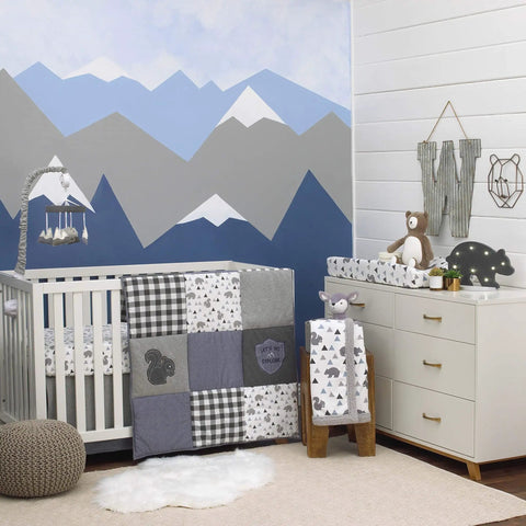 Nursery with a mountain mural, crib, quilt, and Metallic Copper Bear Head Wire Wall Art For Nursery Decor And Kid Rooms