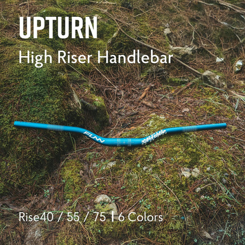 Upturn High Rise Mountain Bike Handlebar 35mm Clamp 800mm Wide 75mm Rise Alloy Riser Bar on forest ground
