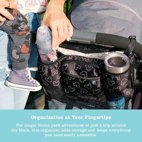 Cups N Cargo Stroller Caddy Organizer With Cup Holder For Any Stroller Universal Fit Durable Mesh Storage Pockets Travel Essential For Parents On The Go Mickey Mouse Black attached to stroller with bottles