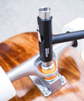 Reds Bearings 608 Set with Stoked Tool on skateboard wheel for smooth spins, tight tolerances, grind ready performance