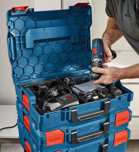 Person opening blue Stackable Tool Storage Case With 1-Click Lock, Top Front And Side Handles For Easy Transport, filled with tools