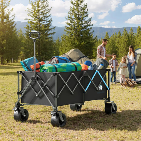 Heavy Duty 48 Inch XL Collapsible Wagon Cart with all terrain wheels and 560 lb capacity carrying camping gear on grass