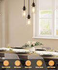 Slick Three Light Black Pendant Fixture With Crystal Clear Glass Shades And Fully Adjustable Suspension Cords above dining table.
