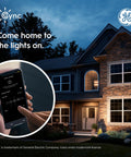 Effortless Install Paddle Dimmer Smart Switch With Matter Ready Wiring And Alexa Support For Smooth Lighting Control Dead Simple Neutral Hook Up And Custom Scenes For Traditional Bulbs. Smart home setup shown outside a well-lit house.