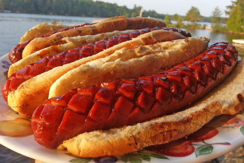 Crosshatch Hot Dog Slicer Tool With Stainless Steel Blades 10 Inch Red Cutter used on grilled hot dogs with diamond patterns