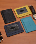 Leather Slim Minimalist Wallet With RFID Protection For Men And Women Front Pocket Card Holder In Ebony on wooden surface