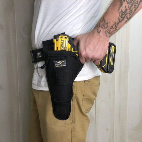 Aims Large Drill Holster for Left Handed Pros Handcrafted in the USA made from 1000D Cordura Nylon holding yellow power drill on waist