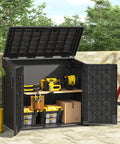 36 Cu Ft Weatherproof Outdoor Storage Cabinet With Dual Lockable Doors And Floor in black, open with tools inside