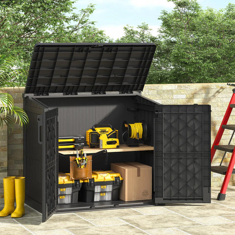 36 Cu Ft Weatherproof Outdoor Storage Cabinet With Dual Lockable Doors And Floor in black, open with tools inside