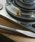 Close-up of Built Tough 8 Inch Pneumatic Caster Wheel With Rigid Plate and 220 Pound Load Capacity precision ball bearing hub.