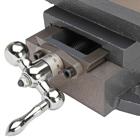 Close-up of Heavy Duty Cross Slide Drill Press Vise With Extra Tall Jaws Sliding Clamp Handle and Precision Castings, showing handle and measurement dial.