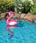 Floating Flamingo Pool Decor For Backyard Fun, 28 Inch Pink Flamingo Accent For Pool Spa Patio And Garden in a pool setting.