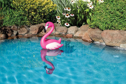 Floating Flamingo Pool Decor For Backyard Fun, 28 Inch Pink Flamingo Accent For Pool Spa Patio And Garden in a pool setting.