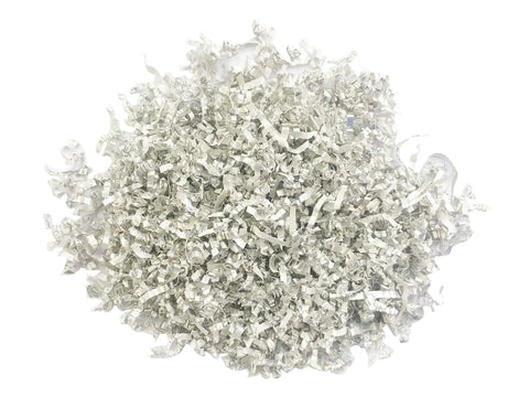 Pile of pre-shaved magnesium shavings from Emergency Fire Starter Kit With Pre Shaved Magnesium, 3.15 Inch Ferro Rod, And 4 Inch Waxed Rope In Waterproof Tin For Quick Safe Fires, Ultimate Survival Gear For Camping And Hiking.