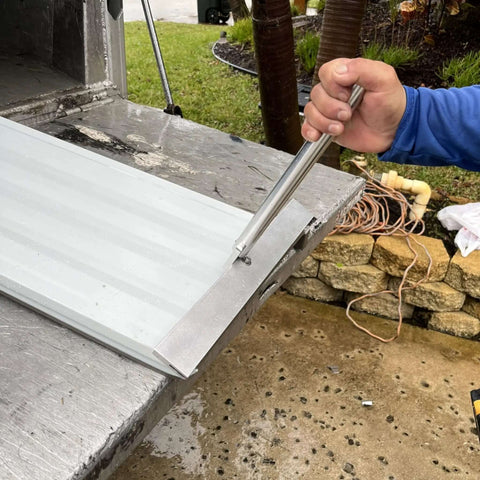 Using 36in Flash Brake Standing Seam Roof Eave Edge Bender Tool With Bracket For Metal Roofing Pros on metal panel outdoors.