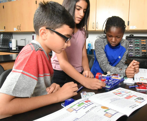 Children using Extreme Electronics Exploration Kit For Kids 8 Plus With Hands On Projects And Student Training Program Study Guide
