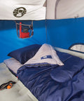 Interior view of Sundome Camping Tent With Rainfly For Two To Six People, showing a sleeping bag and storage pocket.