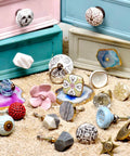 Assorted cabinet knobs, focus on Six Piece Cream Crackle Ceramic Cabinet Knobs Set For Drawers And Dressers, 0.75 Inch Diameter