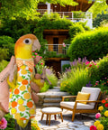 Parrot wearing All In One Two Pack Bird Diaper Kit With Harness And 80 Inch Leash Waterproof Nappy Flight Suit, garden background
