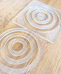 Slick Multi Circle Router Jig For Pro Woodworkers And Craft Pros Offering Laser Cut Acrylic Precision shown with multiple circular acrylic rings.