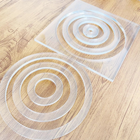 Slick Multi Circle Router Jig For Pro Woodworkers And Craft Pros Offering Laser Cut Acrylic Precision shown with multiple circular acrylic rings.