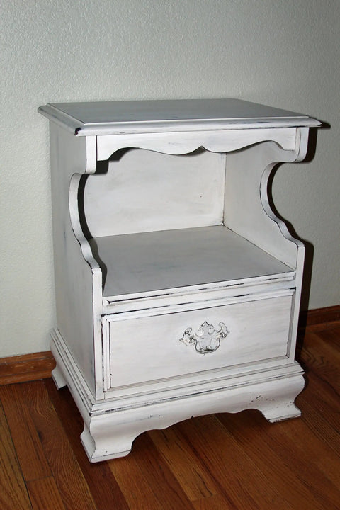 Top Tier Paste Wax For Wood And Cabinet Surfaces With Real Beeswax Blend delivering a hella smooth finish on a white nightstand.