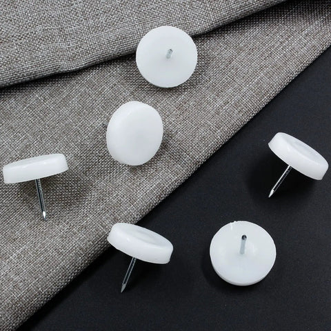 50 Pack Nail On Chair Sliders Round 1 Inch 25mm Plastic Beefy Glides For Heavy Duty Furniture Easy Moving Anti Scratch Floor Protectors For Hardwood Floors White, shown on fabric surface