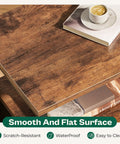 Close-up of Two Pack Nightstand Set With Fabric Drawers And Mesh Shelf, Rustic Brown, showing smooth surface with book and coffee.